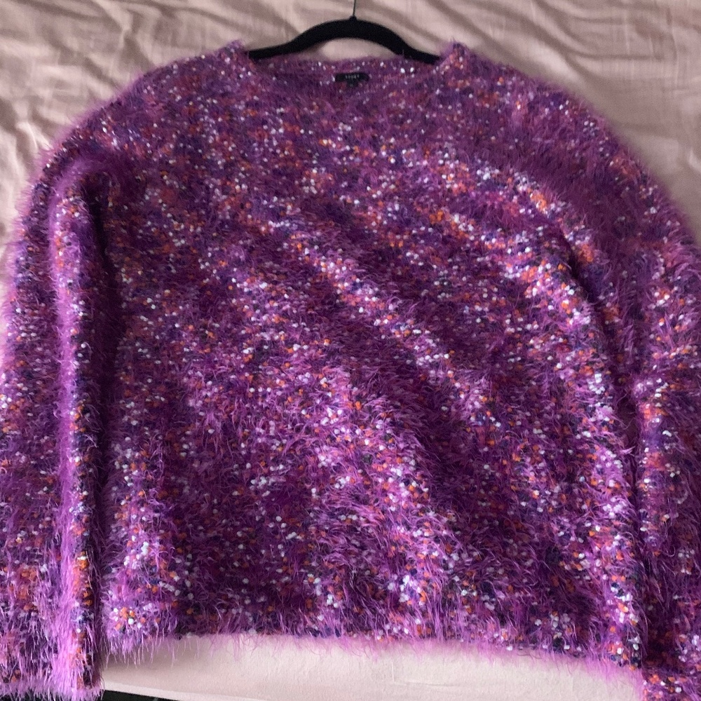 Purple, fuzzy sweater
